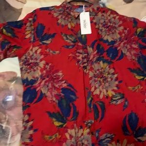 It’s a red two piece men outfit